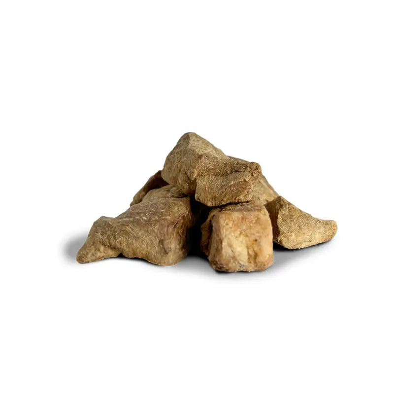 A small pile of PetWell freeze dried beef heart treat pieces