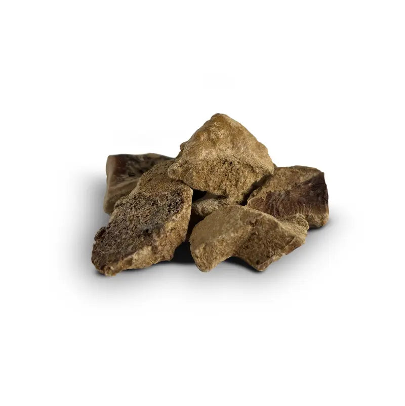 A small pile of PetWell freeze dried beef liver treat pieces